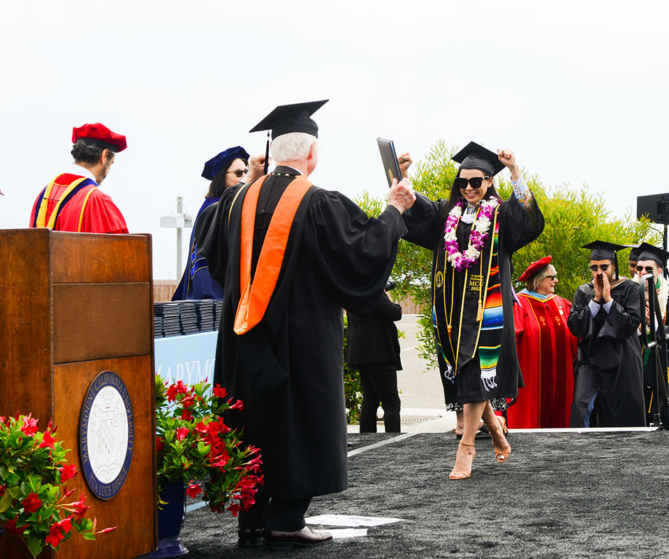 College student receiving diploma